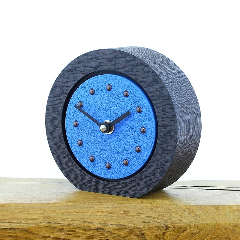 Round Light Blue Mantel Clock, Black Frame, Antique Studs, Black Hands