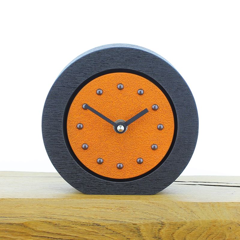 Round Orange Mantel Clock, Black Frame, Antique Studs, Black Hands