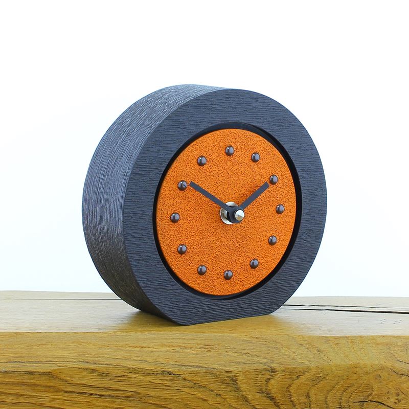 Round Orange Mantel Clock, Black Frame, Antique Studs, Black Hands