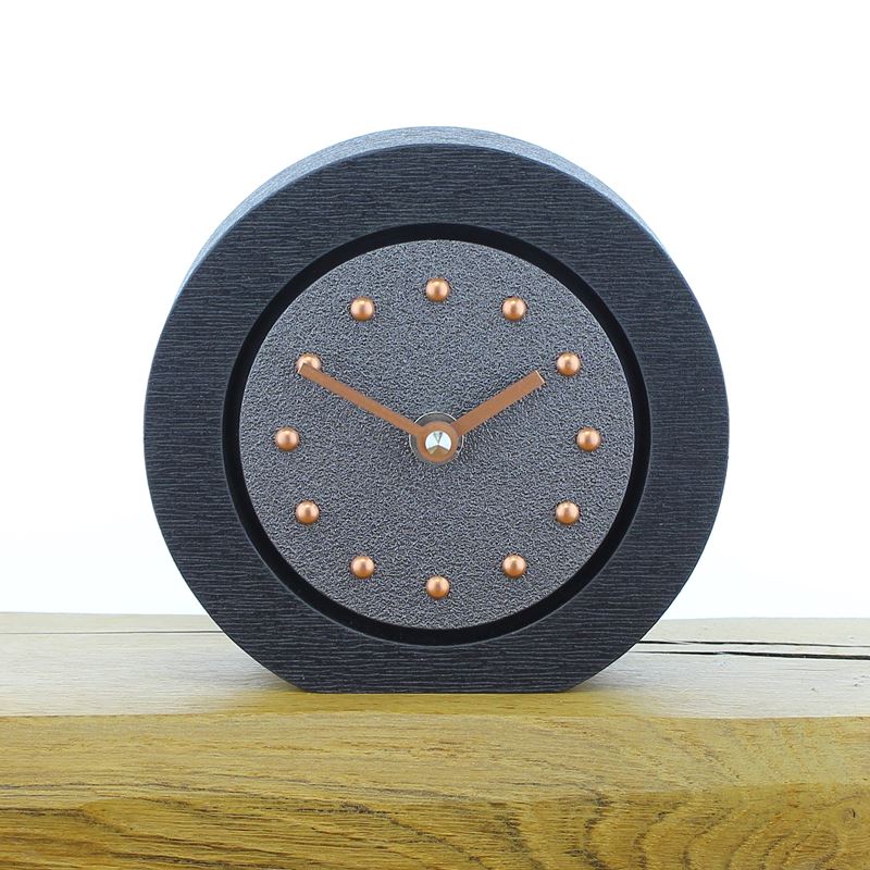 Round Pewter Coloured Mantel Clock, Black Frame, Copper Studs and Hands