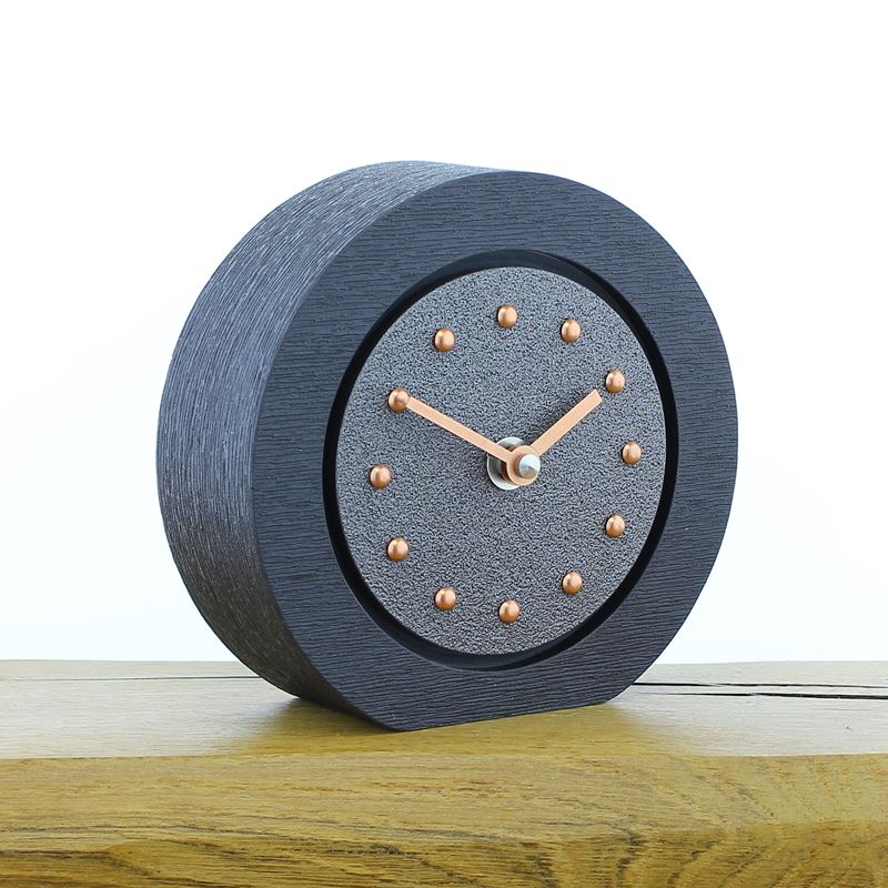 Round Pewter Coloured Mantel Clock, Black Frame, Copper Studs and Hands