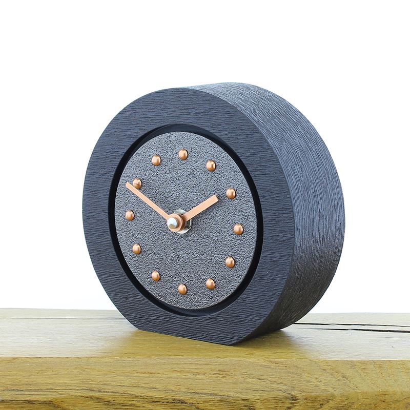 Round Pewter Coloured Mantel Clock, Black Frame, Copper Studs and Hands