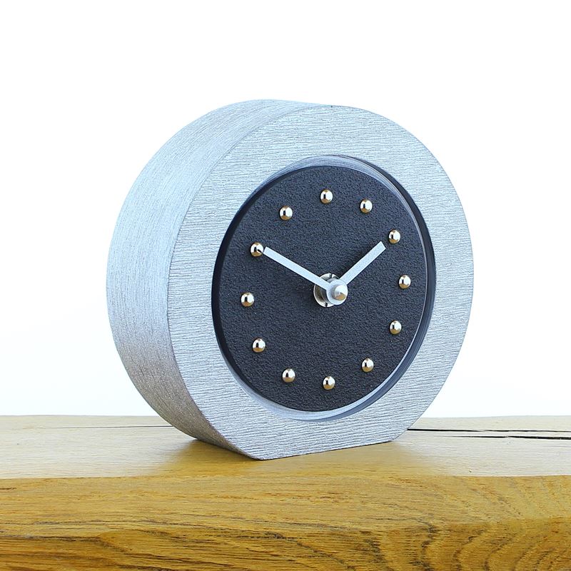 Round Black Mantel Clock, Silver Frame, Silver Studs and Hands
