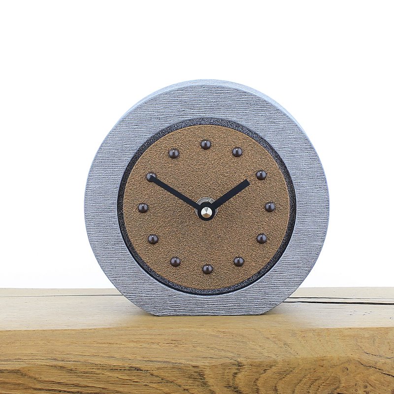 Round Copper Mantel Clock, Silver Frame, Antique Studs and Black Hands
