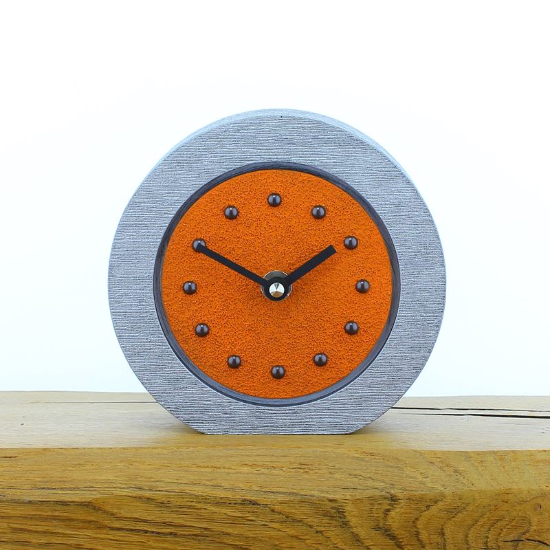 Round Orange Mantel Clock, Silver Frame, Antique Studs, Black Hands