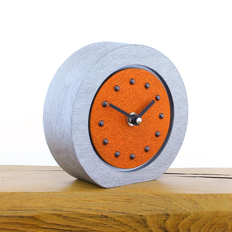 Round Orange Mantel Clock, Silver Frame, Antique Studs, Black Hands