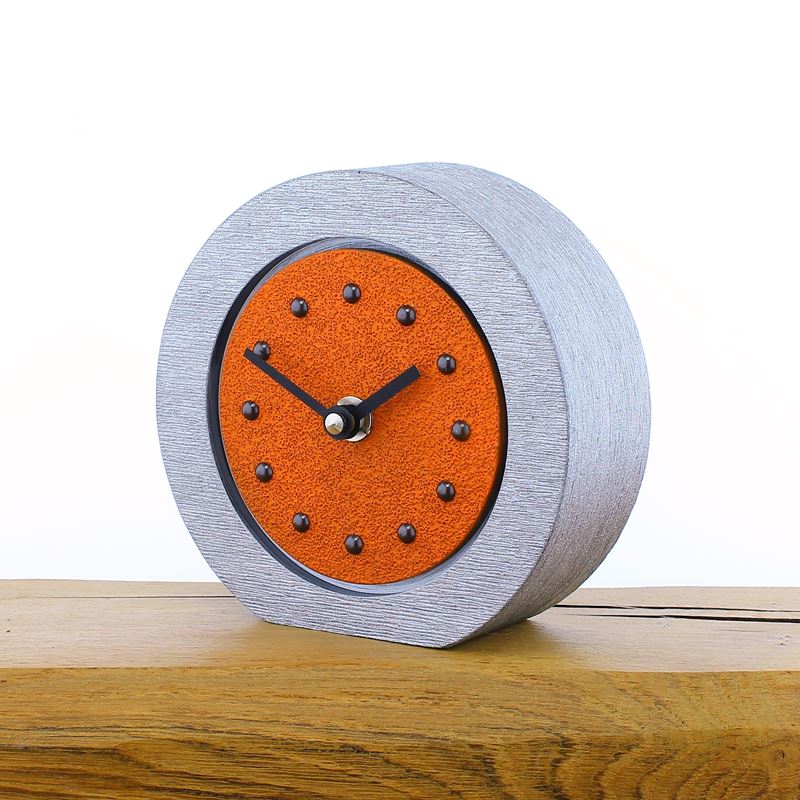 Round Orange Mantel Clock, Silver Frame, Antique Studs, Black Hands