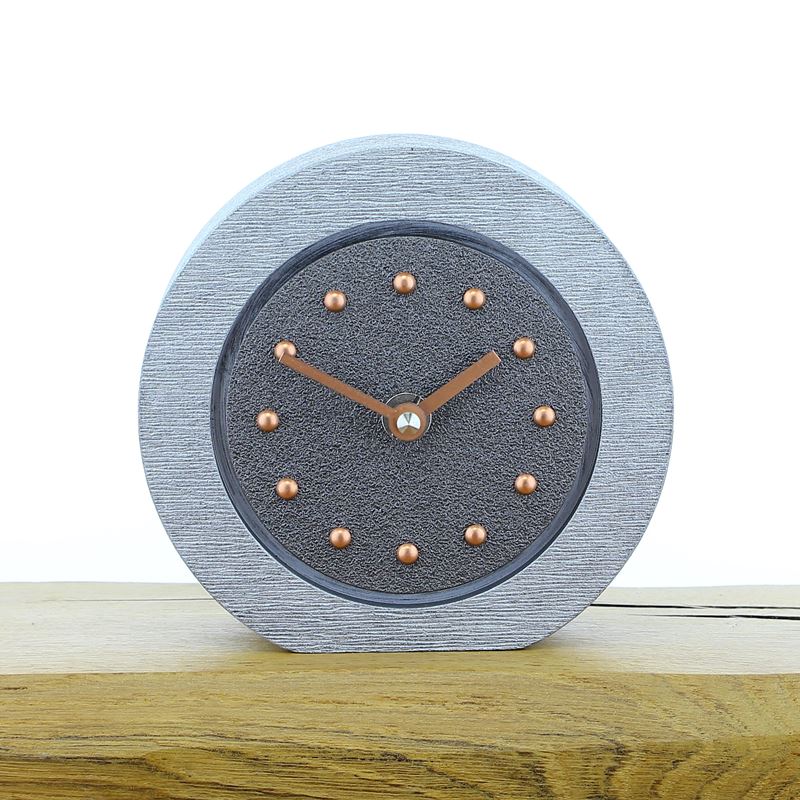 Round Pewter Coloured Mantel Clock, Silver Frame, Copper Studs and Hands