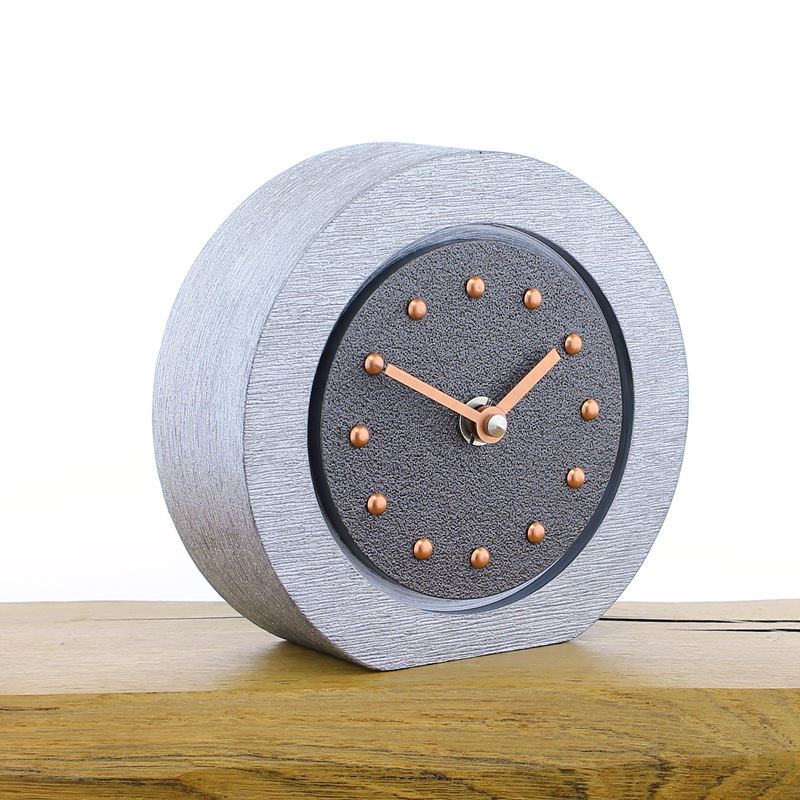 Round Pewter Coloured Mantel Clock, Silver Frame, Copper Studs and Hands