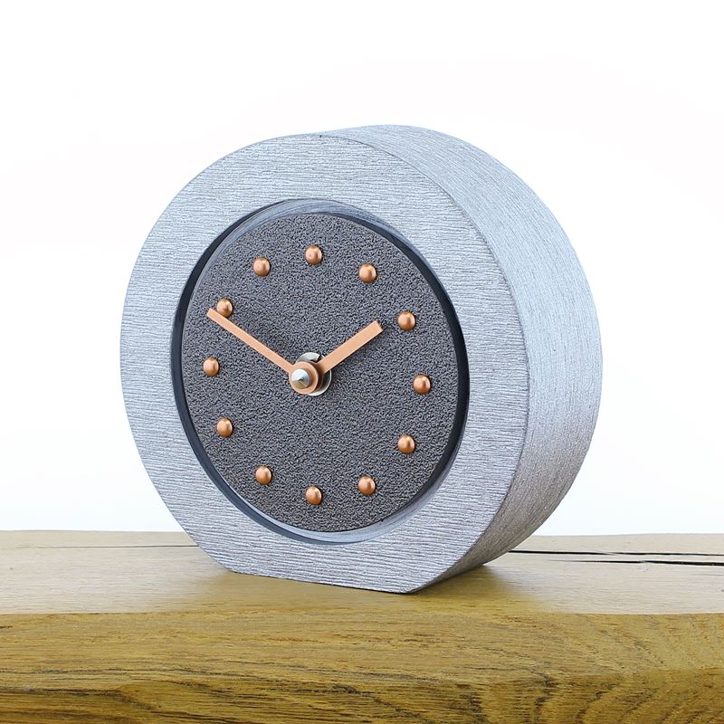 Round Pewter Coloured Mantel Clock, Silver Frame, Copper Studs and Hands