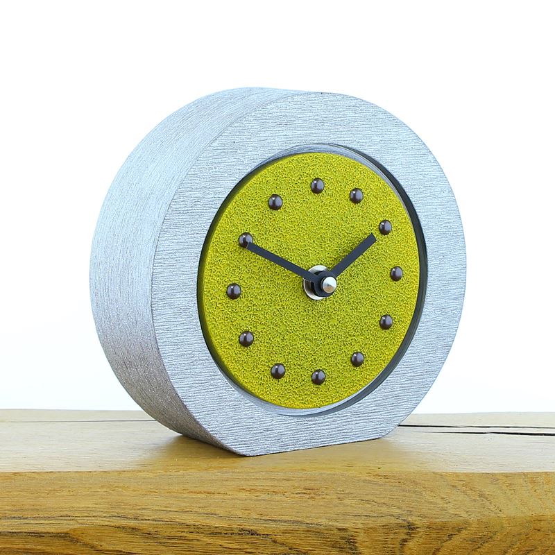 Round Yellow Mantel Clock, Silver Frame, Antique Studs, Black Hands