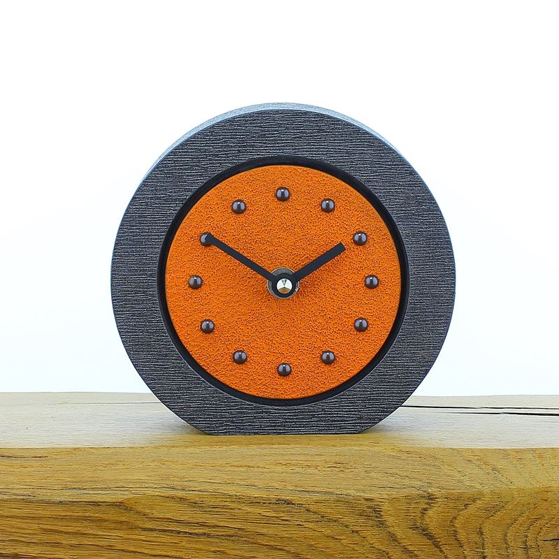 Round Orange Mantel Clock, Pewter Frame, Antique Studs, Black Hands