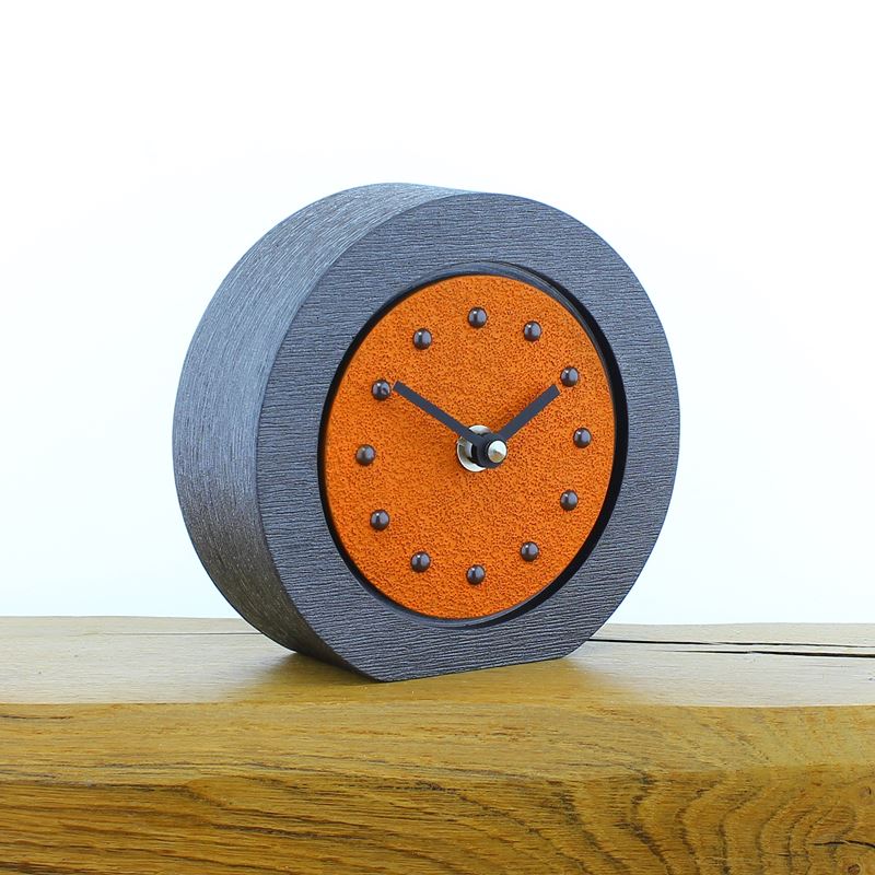 Round Orange Mantel Clock, Pewter Frame, Antique Studs, Black Hands