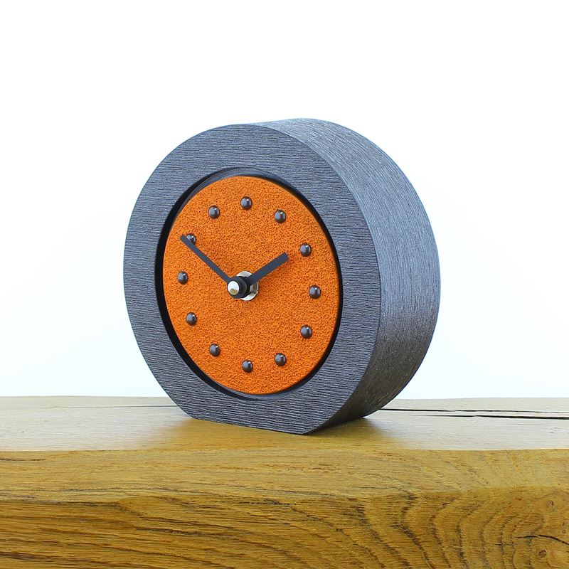 Round Orange Mantel Clock, Pewter Frame, Antique Studs, Black Hands