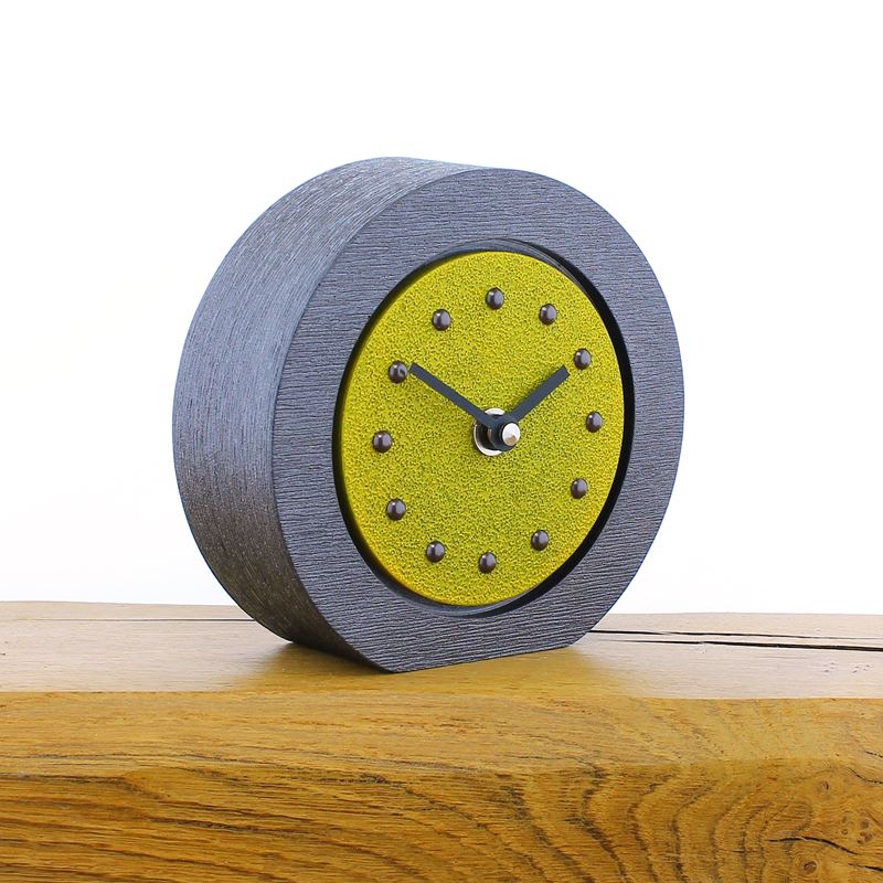 Round Yellow Mantel Clock, Pewter Frame, Antique Studs, Black Hands