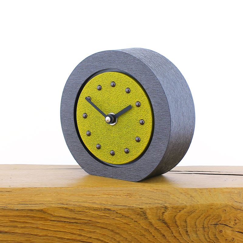 Round Yellow Mantel Clock, Pewter Frame, Antique Studs, Black Hands