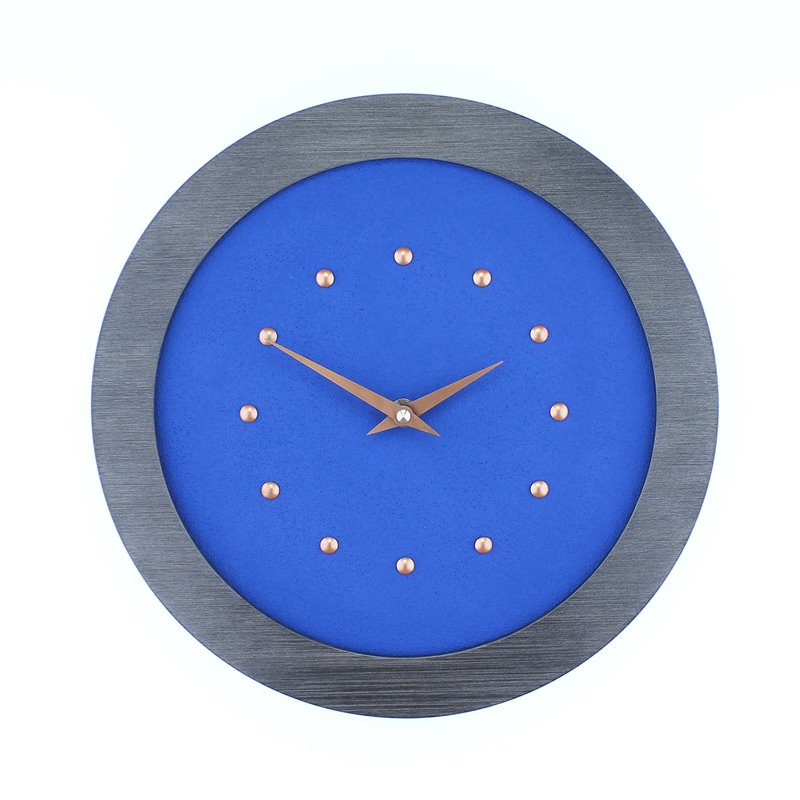 Dark Blue Wall Clock in Pewter Coloured Frame, Copper Studs and Hands.
