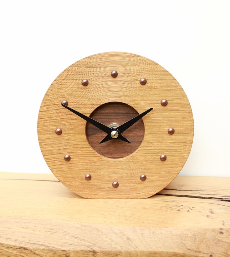 Round Oak mantel Clock with Walnut Face and Antique Studs