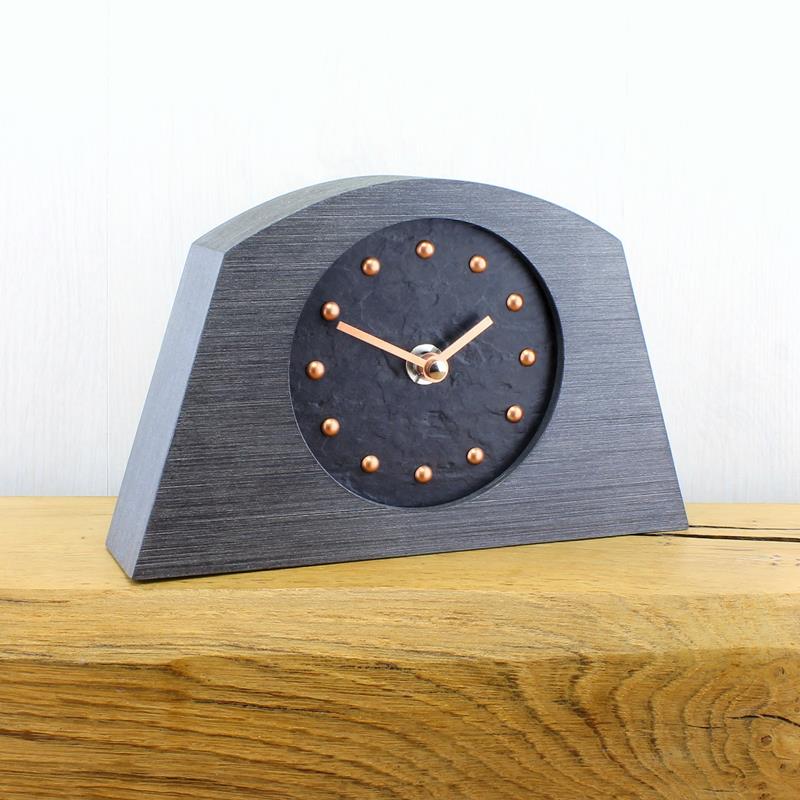 Slate Effect Mantel Clock in a Arched Pewter Coloured Frame with Copper Studs and Hands