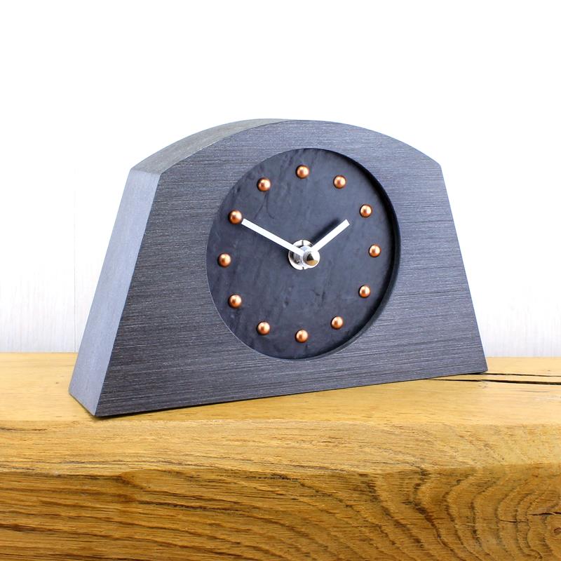 Slate Effect Mantel Clock in a Arched Pewter Coloured Frame with Copper Studs and Silver Hands