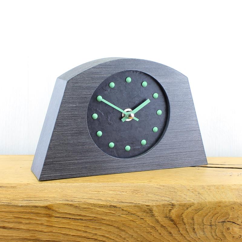 Slate Effect Mantel Clock in a Arched Pewter Coloured Frame with Light Green Studs and Hands