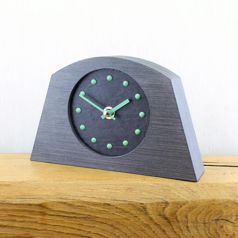 Slate Effect Mantel Clock in a Arch Shaped Pewter Coloured Frame with Green Studs and Hands