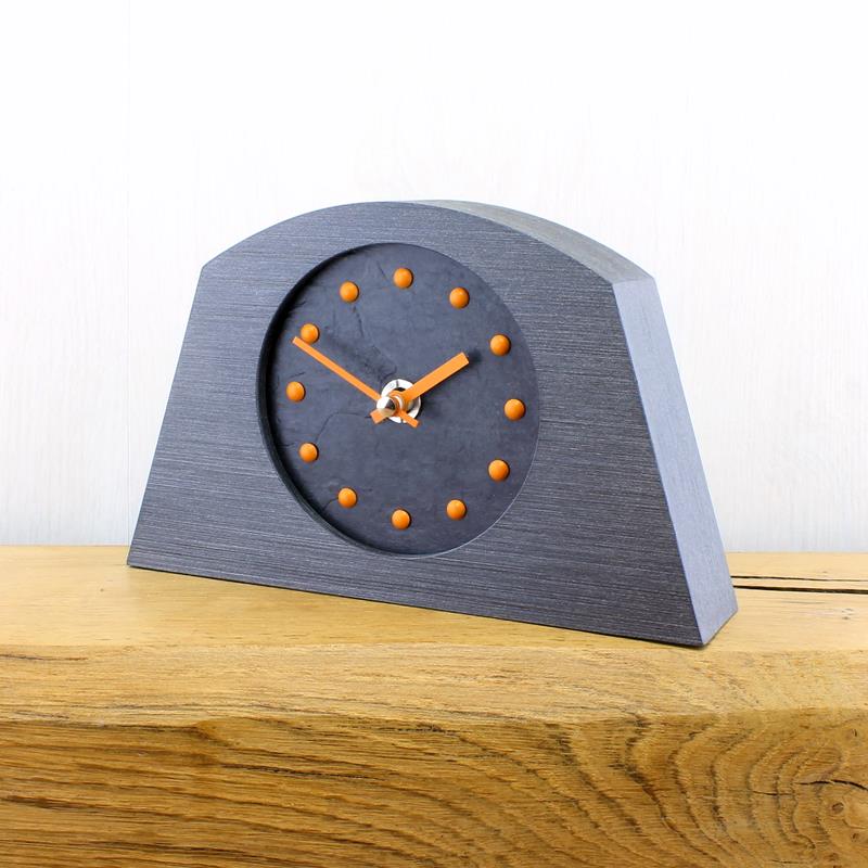 Slate Effect Mantel Clock in a Arch Shaped Pewter Coloured Frame with Orange Studs and Hands