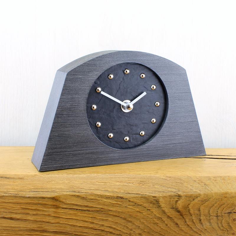 Slate Effect Mantel Clock in a Arched Pewter Coloured Frame with Silver Studs and Hands