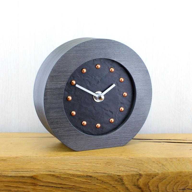 Slate Effect Mantel Clock in a Pewter Coloured Frame with Copper Studs and Silver Hands
