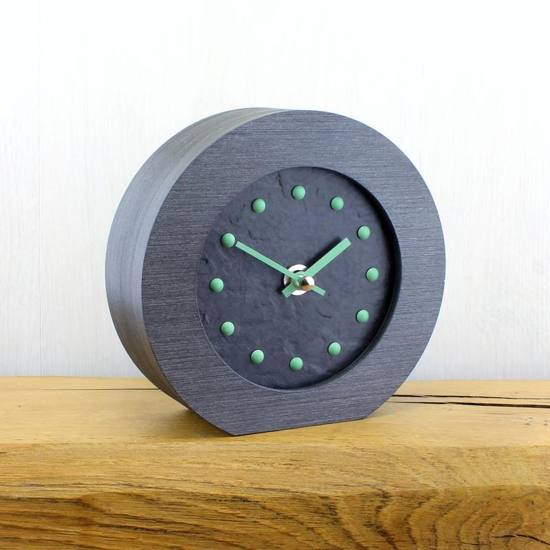 Slate Effect Mantel Clock in a Pewter Coloured Frame with Green Studs and Hands