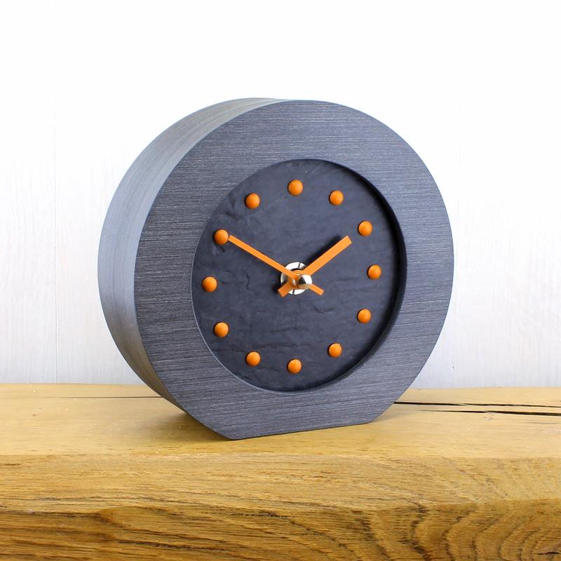 Slate Effect Mantel Clock in a Pewter Coloured Frame with Orange Studs and Hands