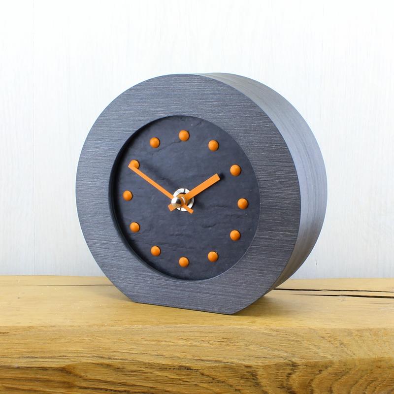 Slate Effect Mantel Clock in a Pewter Coloured Frame with Orange Studs and Hands