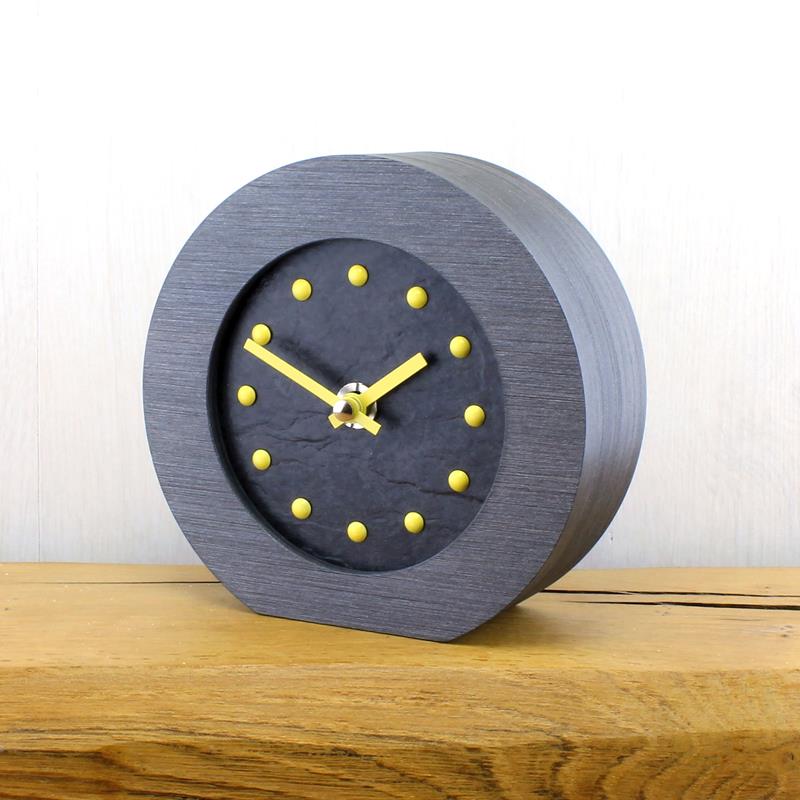 Slate Effect Mantel Clock in a Pewter Coloured Frame with Yellow Studs and Hands