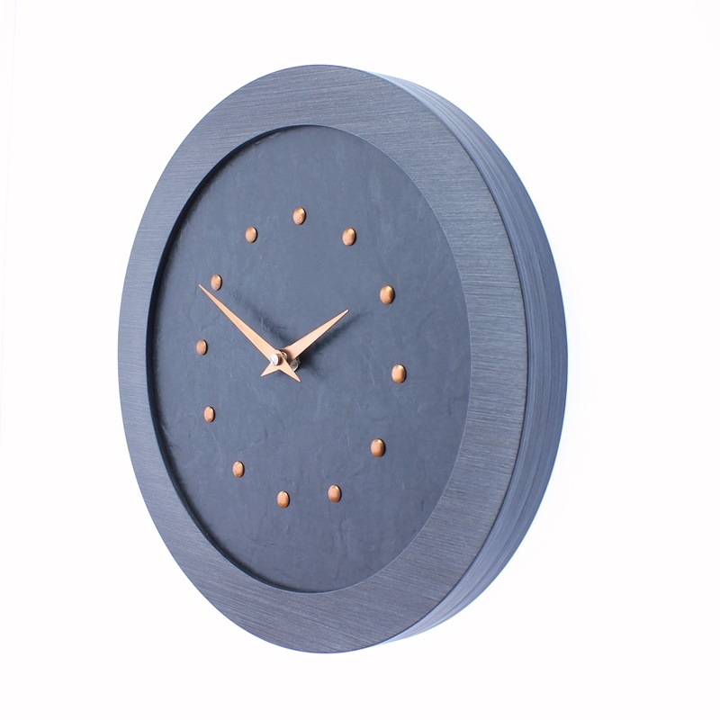 A Stylish Slate Effect Wall Clock in a Pewter Coloured Frame with Bright Copper Studs and Hands