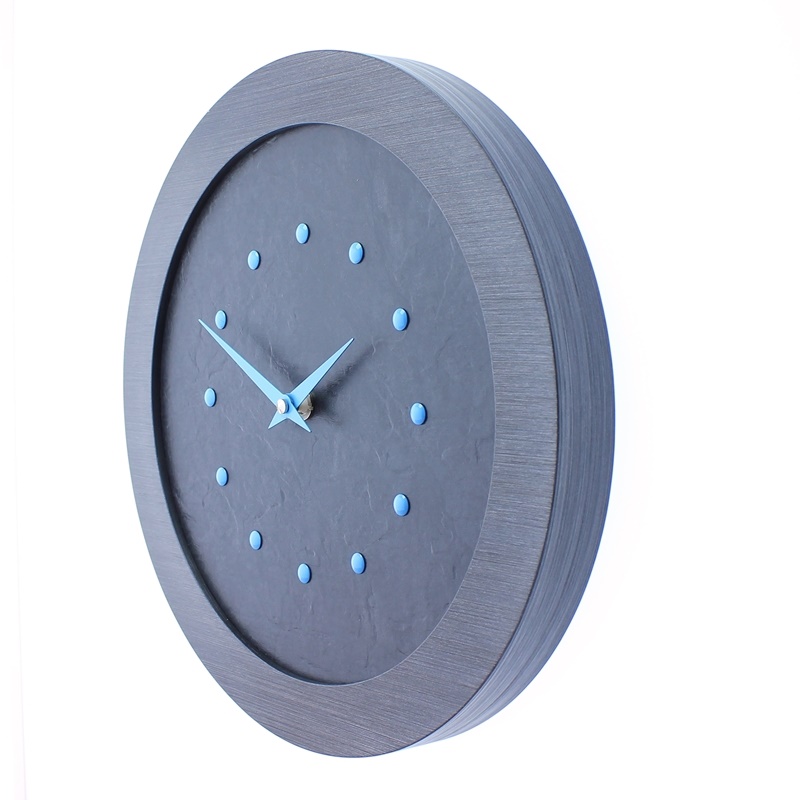 A Stylish Slate Effect Wall Clock in a Pewter Coloured Frame with Light Blue Studs and Hands