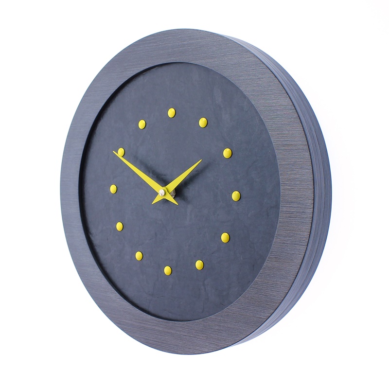 A Stylish Slate Effect Wall Clock in a Pewter Coloured Frame with Yellow Studs and Yellow Hands